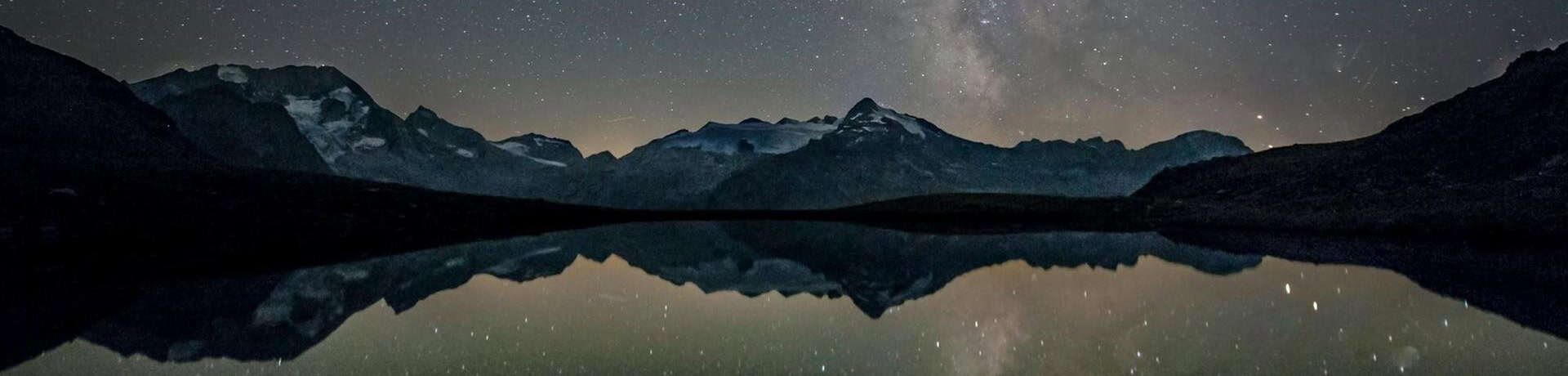 moutains with lake and stars